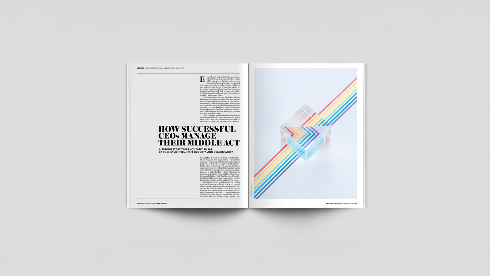 An image of a magazine opened to a spread. Right hand side has white background with one column of text and large title text. Right hadn side has an image of a glass cube with a rainbow underneath refracted through the glass cube. Made in Adobe Indesign