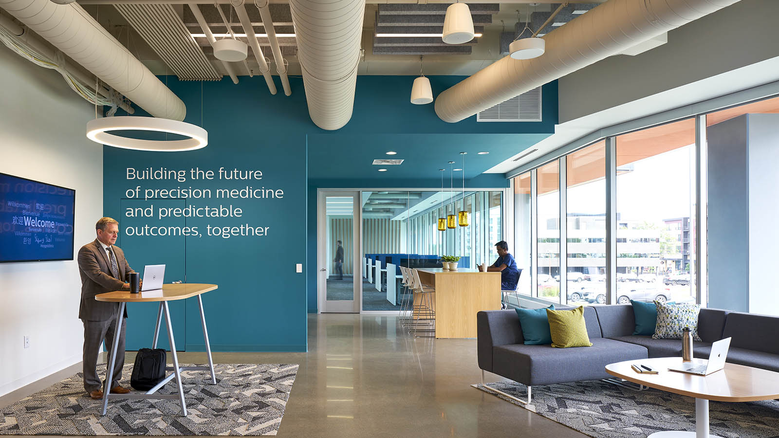 A photograph of office space with color walls and typography