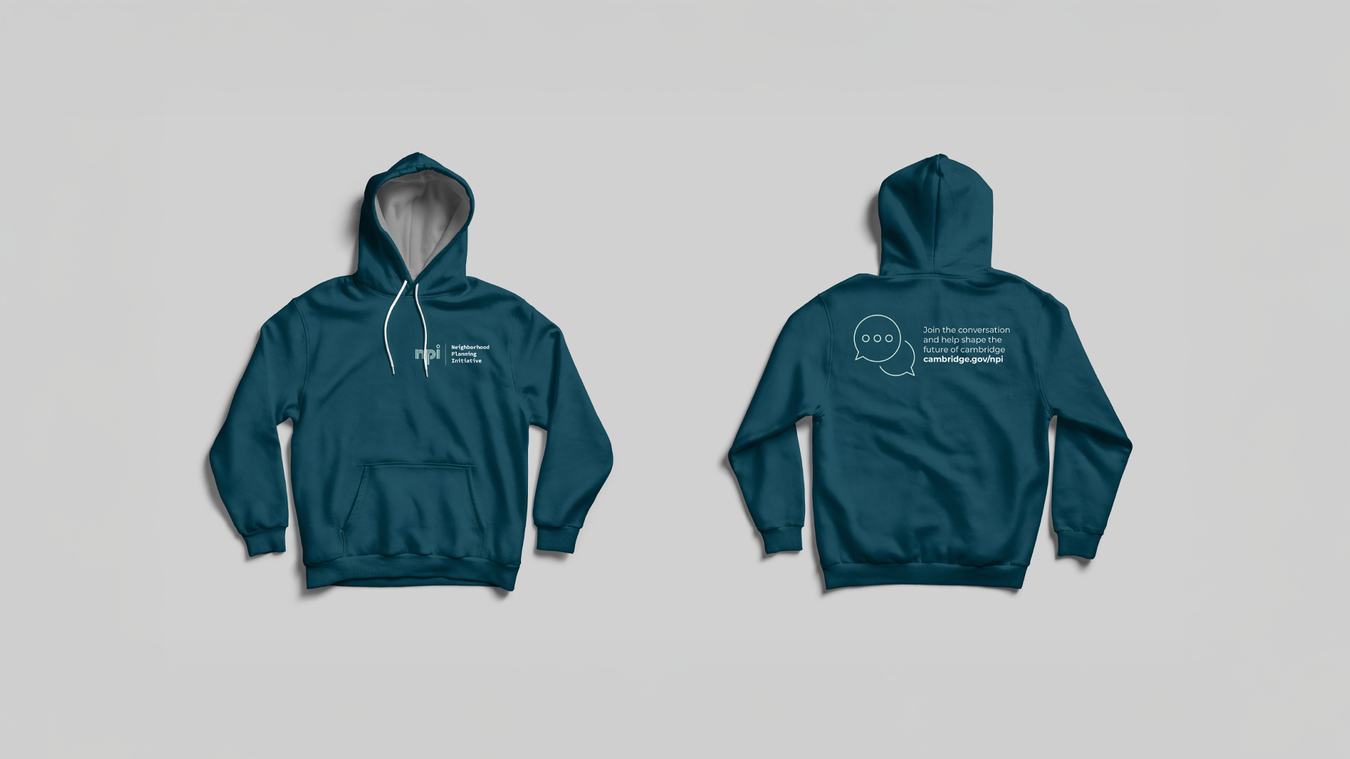 An image of two sweatshirts. One from the front and one on with the back face up. both are dark teal in color. the front has the NPI logo on the top right. the back has typography and an icon. design made in Adobe Indesign and Illustrator.